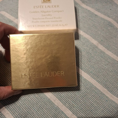 Estee Lauder collectible powder new with gold alligator case
