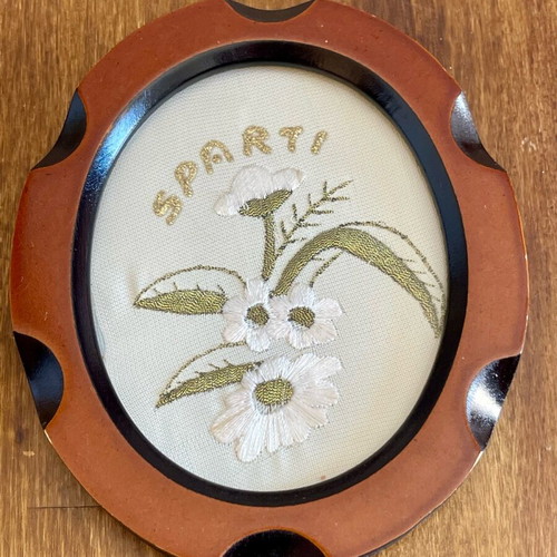 Wooden embroidered plaque used with Sparta theme