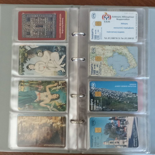 Phone card collection used, 42 pieces with album