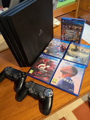 PlayStation 4 Pro 1TB like new with 2 Sony DualShock V2 controllers and 6 games