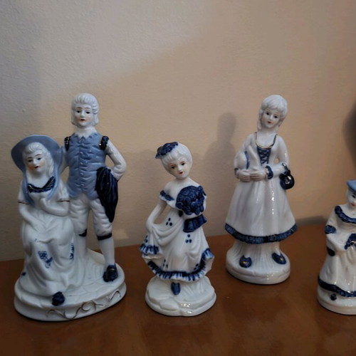 Porcelain decorative figures like new, set of four