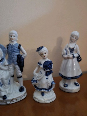 Porcelain decorative figures like new, set of four