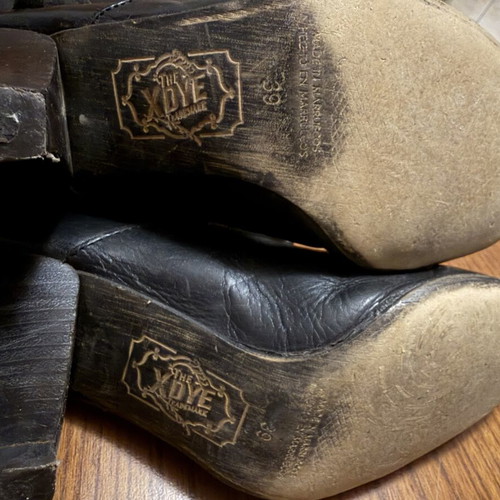 The Xdye Trademark black leather boots size 39 used