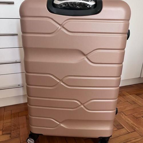 Suitcase new, unused, salmon color with lock and wheels
