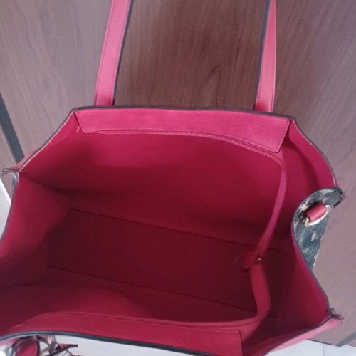 Bag red with tiger print on side like new, large capacity