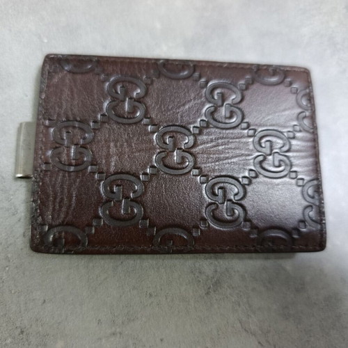 Gucci money clip in brown leather like new with embossed GG logo