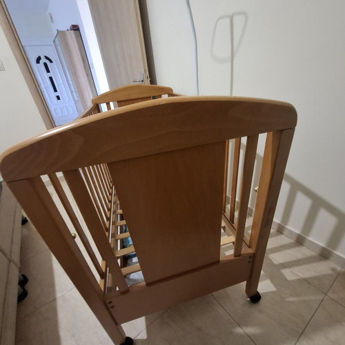 Baby cot made of solid wood with slats and drawer, like new