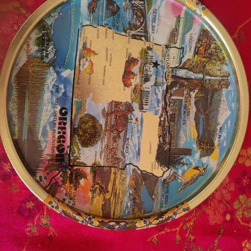 Metal coaster used with vintage Oregon state map