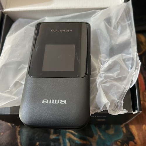 Aiwa FP-24BKMKII phone with English menu like new