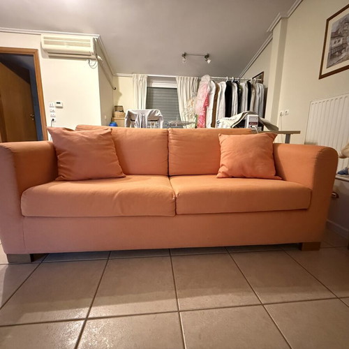Sofa bed SATO used with two decorative pillows and throw