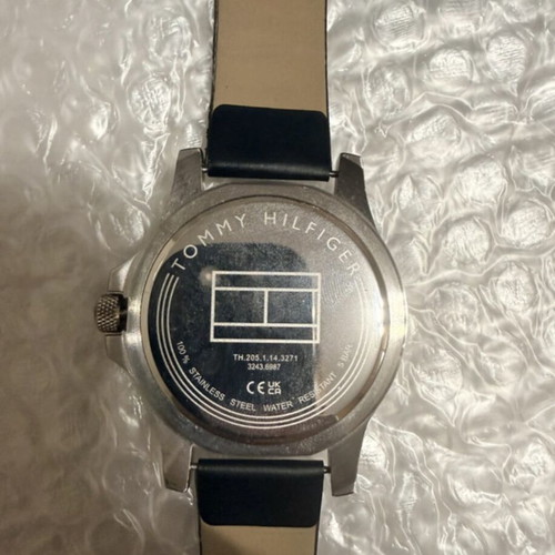 Tommy Hilfiger wristwatch with grey and silver case and bracelet
