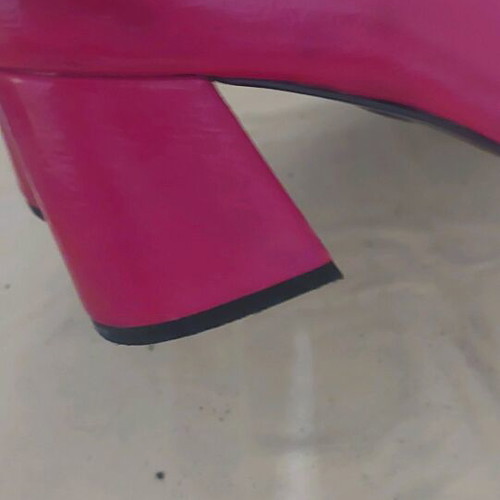 Red ankle boots like new, size 39, striking design