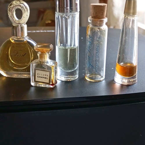 Perfume miniatures used, pack with wear