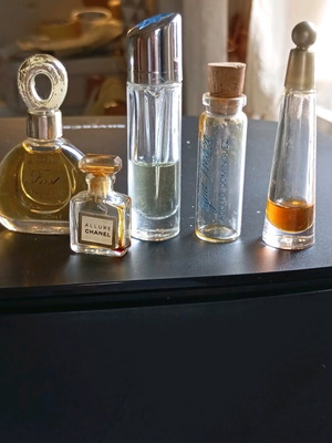 Perfume miniatures used, pack with wear