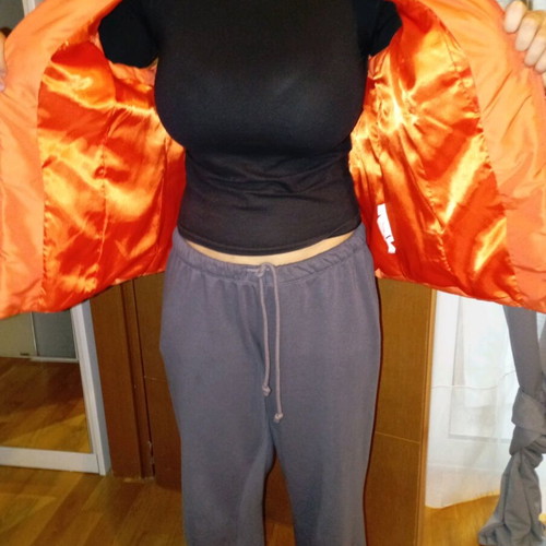 Sleeveless women's jacket like new, size large, orange