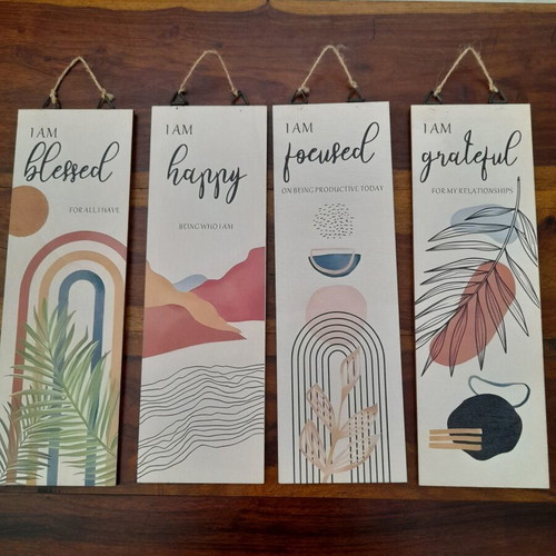Wooden wall plaques with four positive messages, like new