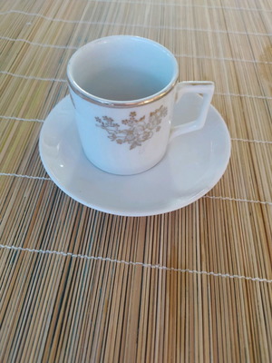 Coffee cup and saucer set white gold