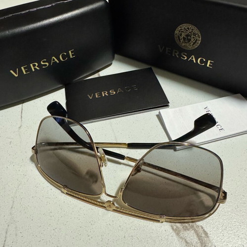 Versace Sunglasses like new, gold men's