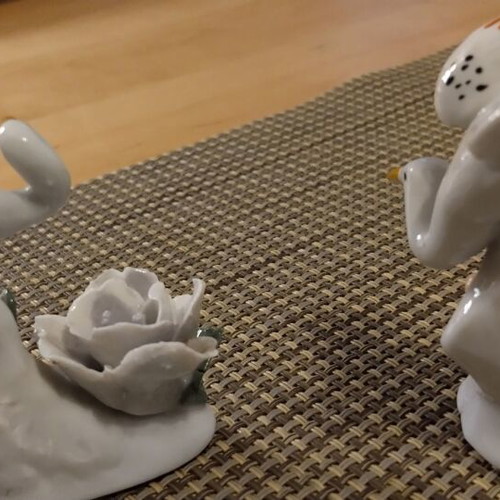 Porcelain miniatures pair with birds like new