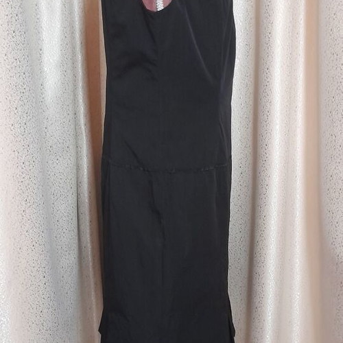 VS black sleeveless dress with round neckline and pleats, size 50