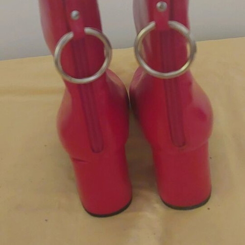 Red ankle boots like new, size 39, striking design