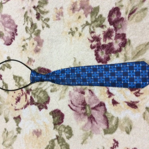 Children's tie like new, white and blue with elastic neck