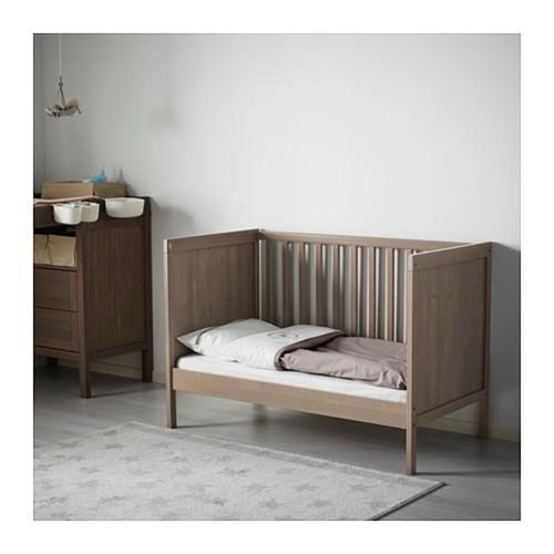 Baby cot used in grey-brown with mattress convertible to bed