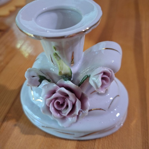 Porcelain candlestick with gilded elements like new