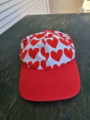 Cap with red hearts for girl or young adult