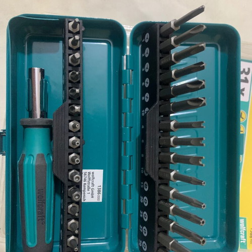 Screwdriver set in metal case with angle handle and ratchet