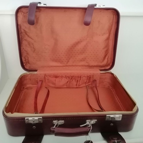 Vintage suitcase used, burgundy color, 1970s with metal clasps