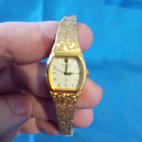 Vintage Orient women's watch used, gold-plated, 17 cm with safety chain