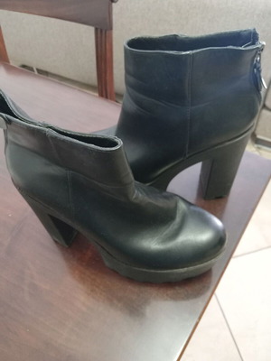 Women's black leather ankle boots in very good condition A To Z Greek