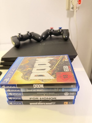 PlayStation 4 1TB like new, 2 consoles with 5 games