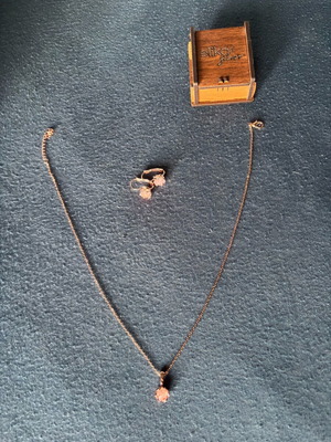 Rose gold necklace and earrings set with pink stone flowers like new