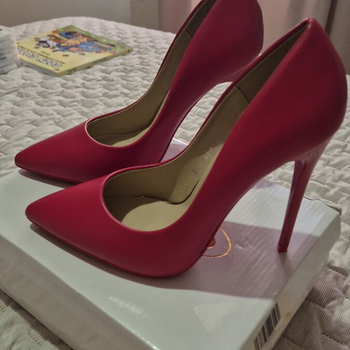 Red high heel pumps