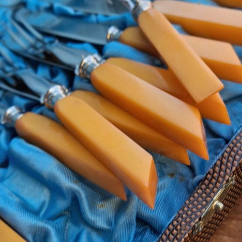 Old set of Vangelis mastic knives, missing one fork
