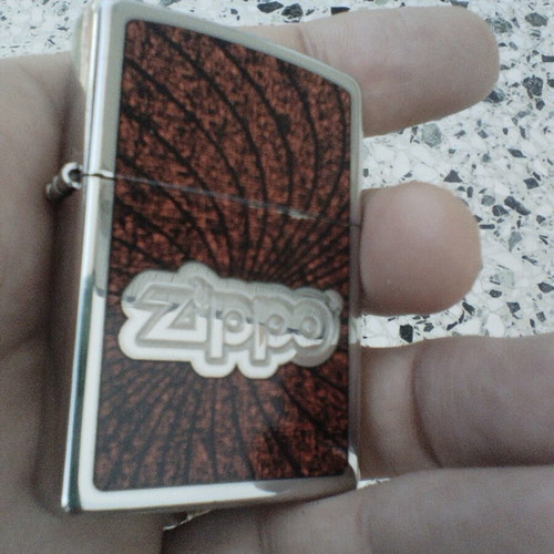 Zippo 2011 lighter with embossed design