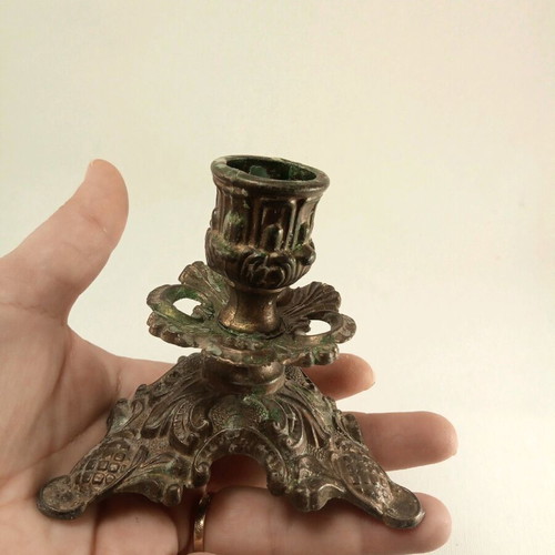Candlestick old used brass with embossed decorations