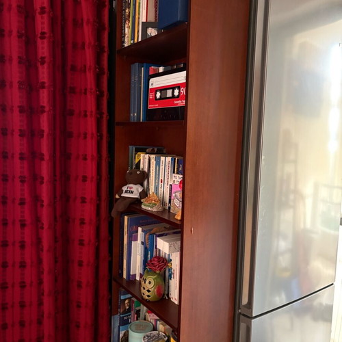 Multipurpose wooden bookcase with adjustable shelves