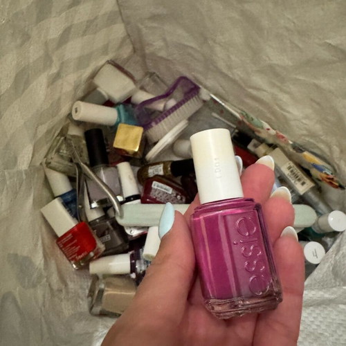 Various nail polishes and nail tools like new