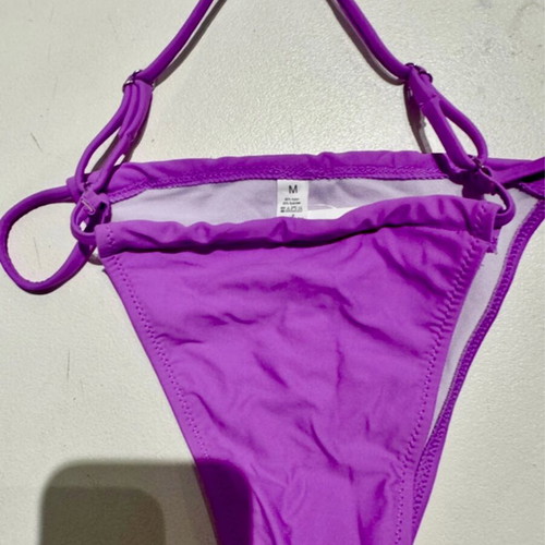 Bikini set new with tags, purple, sizes medium and large
