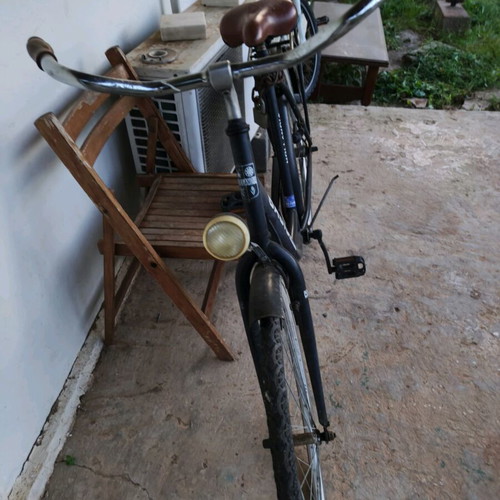 Dutch bicycle used, vintage, black with contra/drum brakes