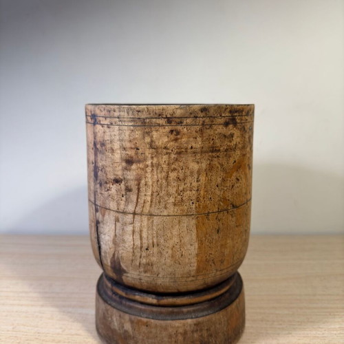 Rustic handmade wooden mortar used