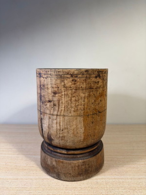 Rustic handmade wooden mortar used