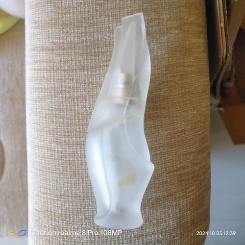 Donna Karan Cashmere Mist perfume bottle used without fragrance