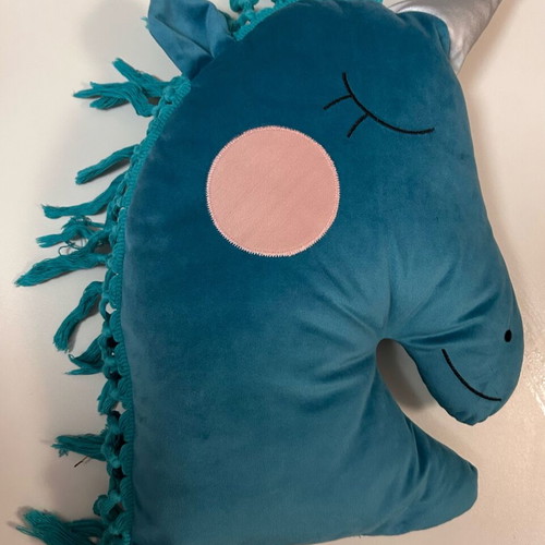 Velvet unicorn pillow used in emerald color