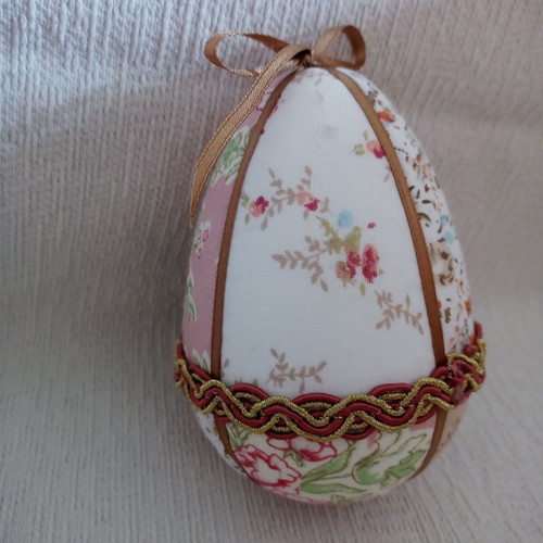Decorative egg used beige pink floral for Easter and spring decor