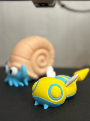 Dunsparce and Omanyte Pokémon medium size, new