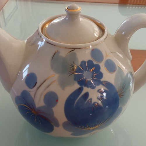 Porcelain teapot used with blue design